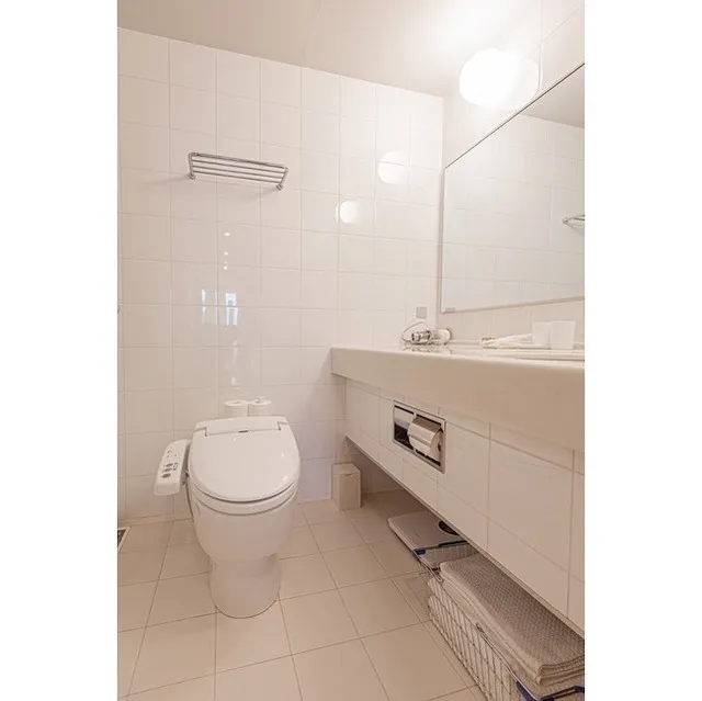 Prudential Tower Residence - Interior - ["Plumbing fixture", "Mirror", "Sink"]