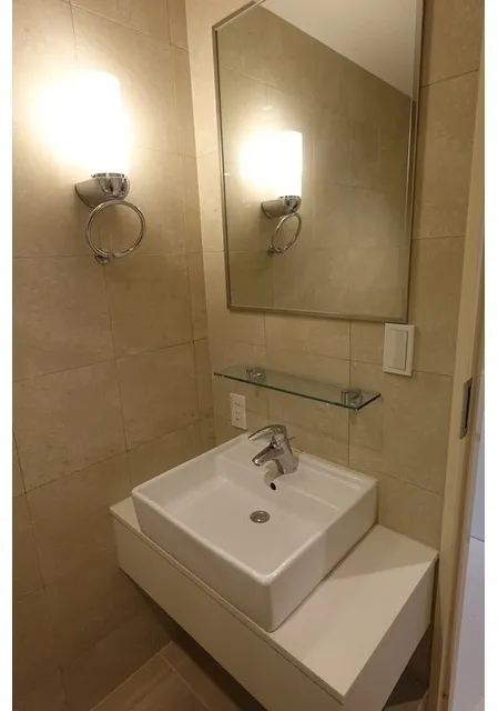 Frontier Residence The Tower Shinagawa - Interior - ["Bathroom Sink", "Plumbing fixture", "Wall"]