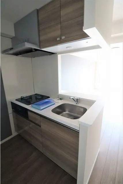 Alpha Court Yahiro - Interior - ["Cabinetry", "Furniture", "Countertop"]