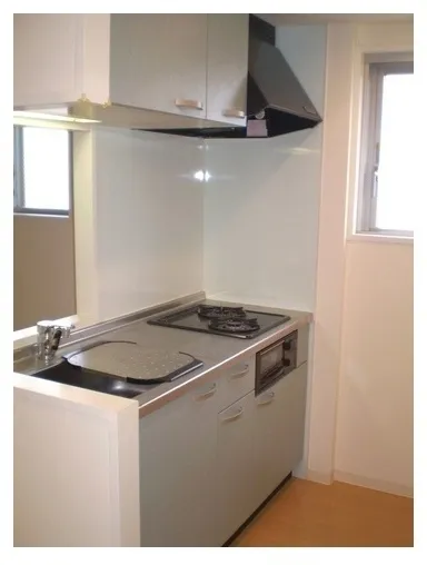 Comforia Shinjuku Gyoen II - Interior - ["Cabinetry", "Kitchen appliance", "Kitchen stove"]