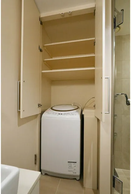 Frontier Residence The Tower Shinagawa - Interior - ["Washing machine", "Wood", "Major appliance"]
