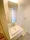 Miraize Nakano Eharacho Residence - Interior - ["Plumbing fixture", "Flooring", "Bathroom Sink"] thumbnail