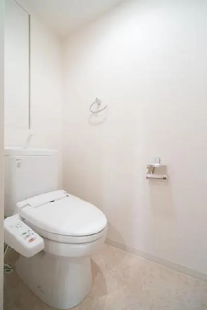 Unison Tower - Interior - ["Toilet seat", "Toilet", "Plumbing fixture"]