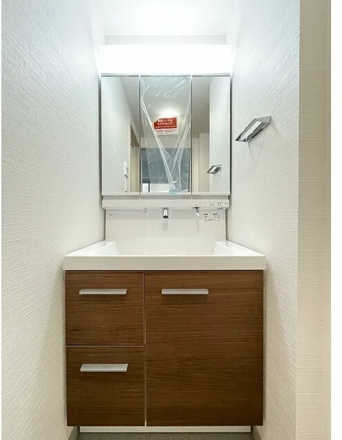 Comfortia Liv Bunkyo Sendagi - Interior - ["Bathroom Sink", "Flooring", "Bathroom cabinet"]