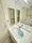 Residia Tsukishima II - Interior - ["Plumbing fixture", "Flooring", "Bathroom Sink"] thumbnail