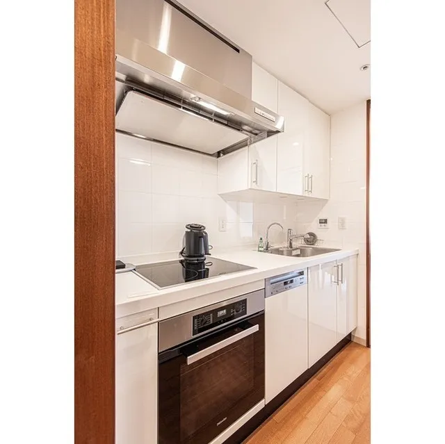 Prudential Tower Residence - Interior - ["Countertop", "Cabinetry", "Tap"]