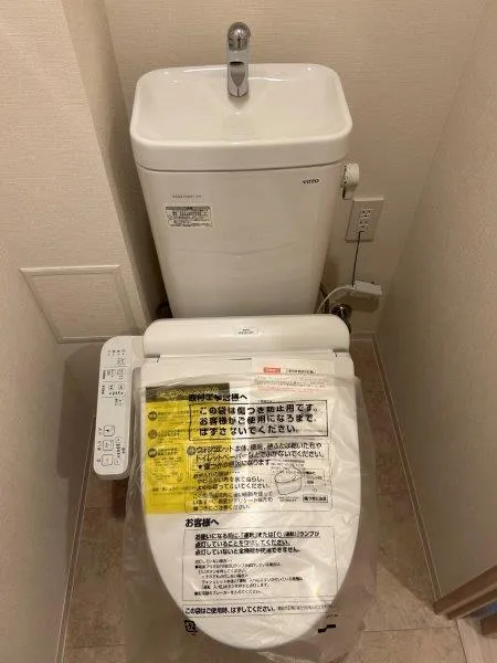Osaka Bay Residence - Interior - ["Toilet seat", "Toilet", "Plumbing fixture"]