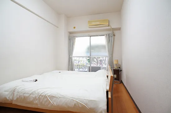 JAPT Gotanda East - Interior - ["Bedroom", "Bed", "Room"]