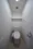 Unison Tower - Interior - ["Toilet seat", "Toilet", "Plumbing fixture"] thumbnail