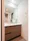 Comforia Liv Nagafukucho - Interior - ["Bathroom Sink", "Flooring", "Bathroom cabinet"] thumbnail