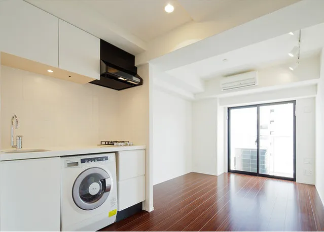 Comforia Toyosu - Interior - ["Laundry room", "Cabinetry", "Clothes dryer"]