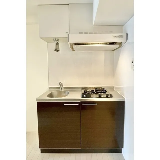 W723 - Interior - ["Cabinetry", "Tap", "Countertop"]