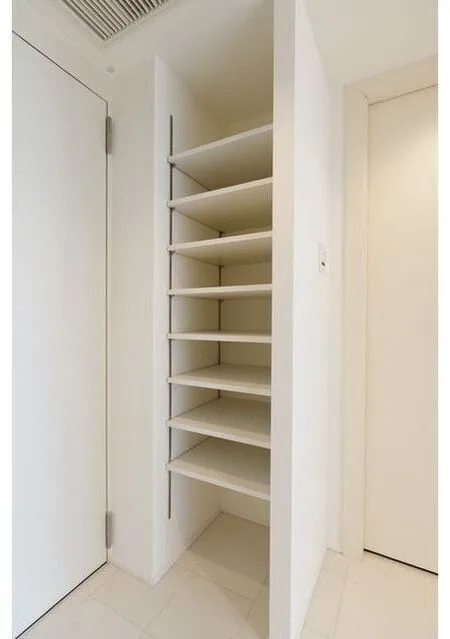 Frontier Residence The Tower Shinagawa - Interior - ["Shelf", "Cabinetry", "Bookcase"]