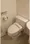 Opus Homes Mita - Interior - ["Toilet seat", "Toilet", "Plumbing fixture"] thumbnail