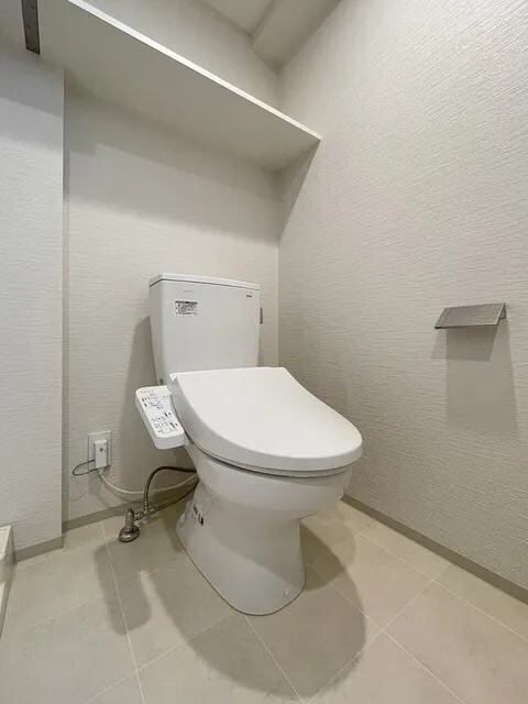 In Front Of Primal Nishi-Ojima Station - Interior - ["Toilet seat", "Flooring", "Plumbing fixture"]