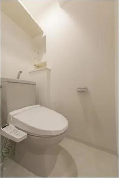 CENTENNIAL TOWER - Interior - ["Toilet seat", "Toilet", "Plumbing fixture"]