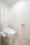 Unison Tower - Interior - ["Toilet seat", "Toilet", "Plumbing fixture"] thumbnail