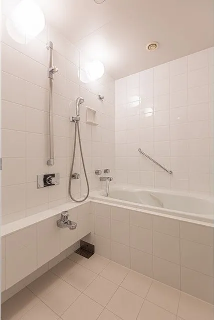 Prudential Tower Residence - Interior - ["Shower head", "Plumbing fixture", "Building"]