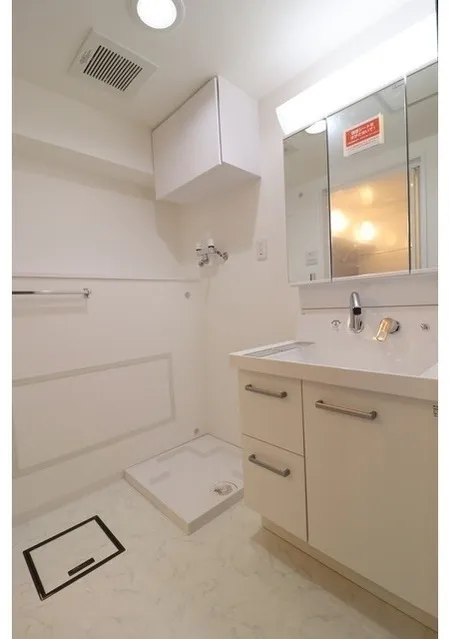 Harumi Urban Plaza - Interior - ["Mirror", "Bathroom cabinet", "Cabinetry"]