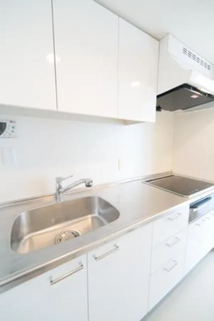 Unison Tower - Interior - ["Kitchen sink", "Cabinetry", "Tap"]