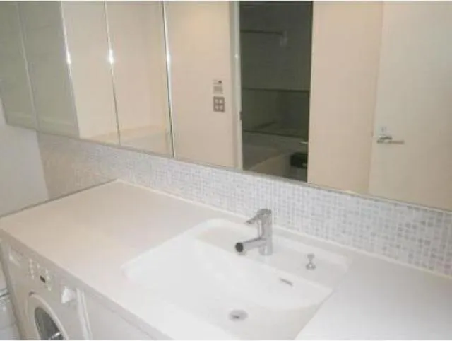 Park Cube Ginza East - Interior - ["Mirror", "Tap", "Bathroom sink"]