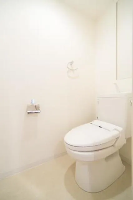 Unison Tower - Interior - ["Toilet seat", "Flooring", "Toilet"]