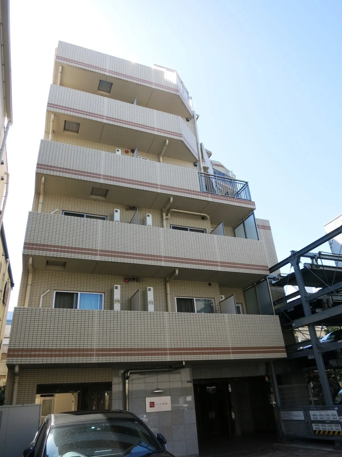 Due Nishi Oshima - Exterior - ["Sky", "Building", "Vehicle"]