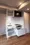 La Perla Takanawa - Interior - ["Cabinetry", "Countertop", "Kitchen stove"] thumbnail